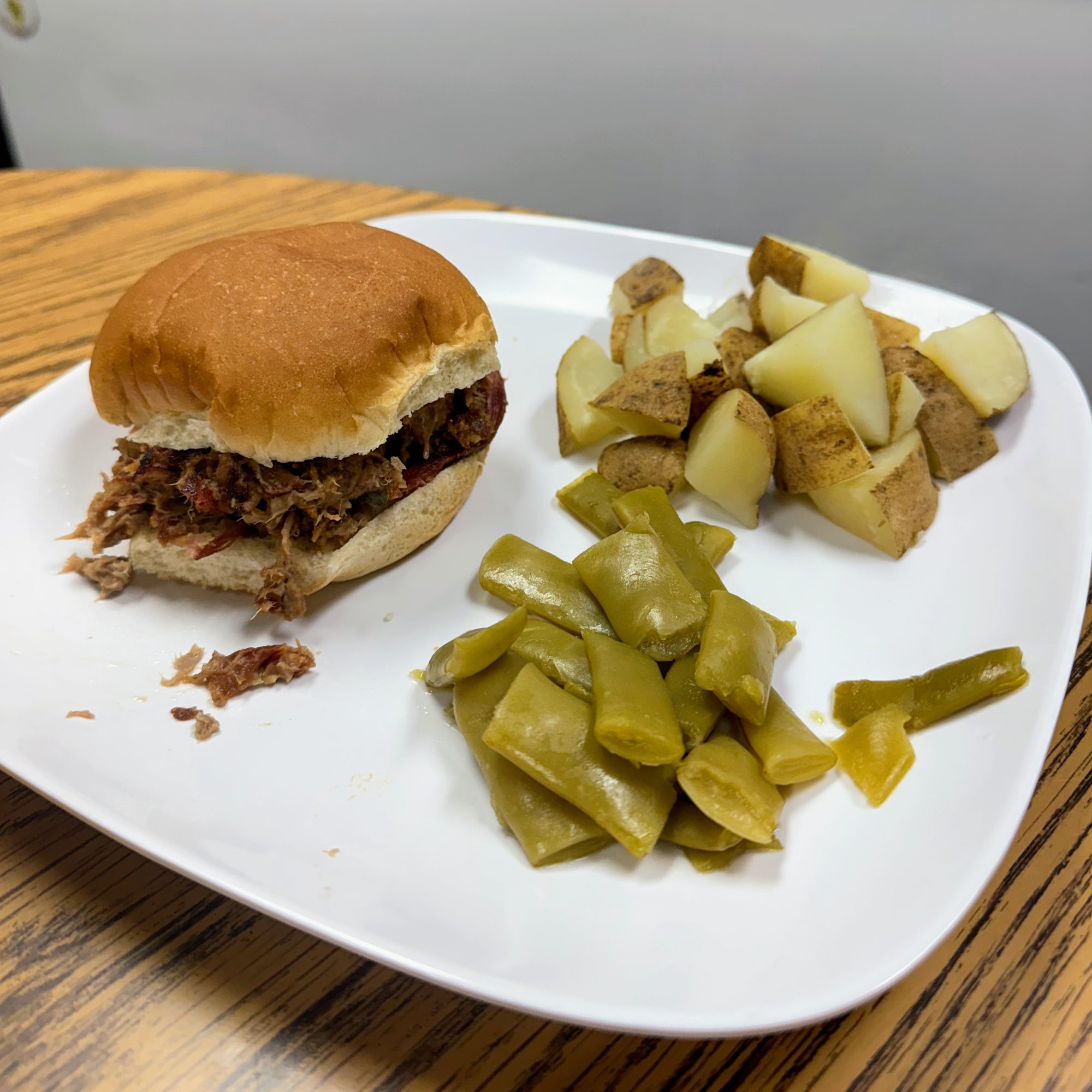 Bright Leaf BBQ Sandwich with Boiled Potatoes and Green Beans