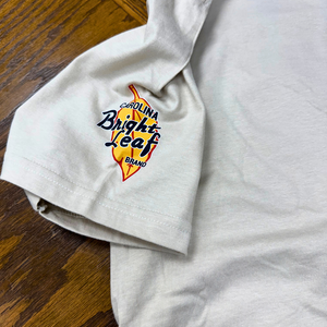 JoCo Ducks Unlimited Collection: Bright Leaf Hot Dogs (Tan)